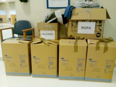 Campaña de recogida de ropa y calzado de invierno en Txurdinagabarri y J. M. Barandiaran para personas refugiadas Cajas de ropa para personas refugiadas, en Txurdinagabarri